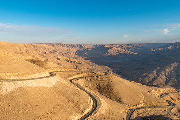 Fototapeta na wymiar King's Highway serpentines in Wadi al-Mujib gorge in sunset, Jordan, Middle East, Asia
