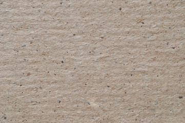 Surface texture of plain wrapping paper, macro.