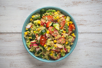 Vitamin salad with quinoa and corn. Top view.