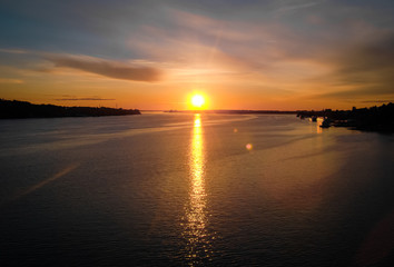 Obraz premium Beautiful sunset. Huge river Volga, town Kostroma, Russia