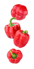falling bell peppers isolated on white background.