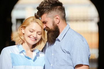 Feeling happy together. Loving couple of woman and hipster dating outdoor. Sensual woman and bearded man enjoy romantic date. Couple in love on summer day. Feeling love and romance