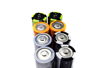 Salt and alkaline batteries, source of energy for portable technology. AAA and AA batteries