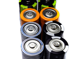 Salt and alkaline batteries, source of energy for portable technology. AAA and AA batteries