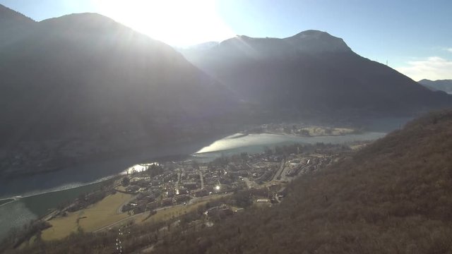 Panoramic aerial view of partially frozen Lake Endine, one of the most attractive tourist sites in the province of Bergamo, Italy