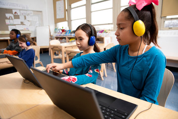 Students working on laptop computers