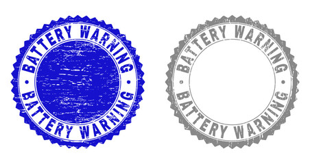 Grunge BATTERY WARNING stamp seals isolated on a white background. Rosette seals with distress texture in blue and grey colors. Vector rubber overlay of BATTERY WARNING text inside round rosette.