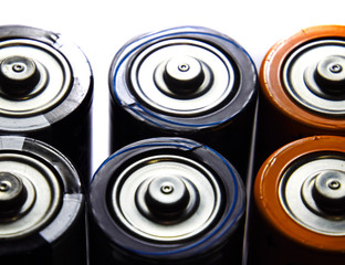 Salt and alkaline batteries, source of energy for portable technology. AAA and AA batteries
