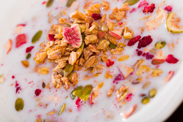 Cereals muesli with dried fruits and milk