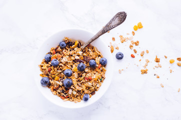 Bowl of homemade granola with yogurt
