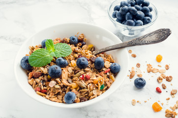 Bowl of homemade granola with yogurt