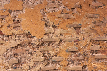 Old wall of bare bricks