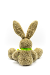 Hase/ Osterhase von hinten mit grüner Schleife