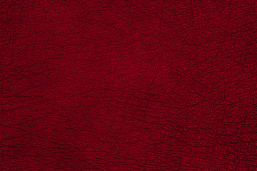 Red leather texture background, faux leather pattern. 