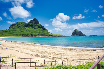 Beach view with mountains and blue sea, travel life