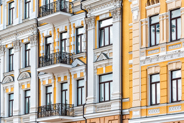 Kyiv, Ukraine View of old modern historic town walls colorful yellow orange buildings of Kiev city in Podil