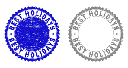 Obraz premium Grunge BEST HOLIDAYS stamp seals isolated on a white background. Rosette seals with grunge texture in blue and gray colors. Vector rubber imitation of BEST HOLIDAYS tag inside round rosette.