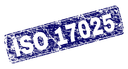 ISO 17025 stamp seal print with grunge texture. Seal shape is a rounded rectangle with frame. Blue vector rubber print of ISO 17025 label with unclean texture.