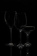 Silhouette of wine glasses, objects on black background