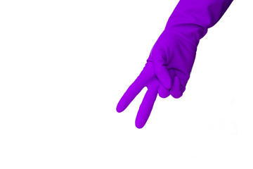 Hand in latex glove showing number two