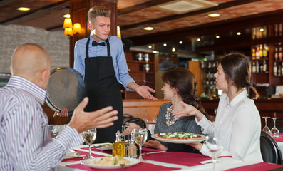 Dissatisfied guests with waiter