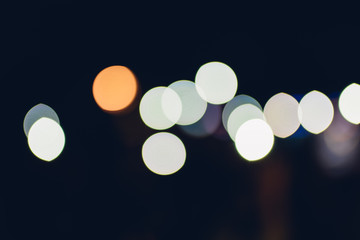 Abstract bokeh or blurred lights background. Night club light blur bokeh, defocused background. Bokeh and flare of blurred background night scene in concert party
