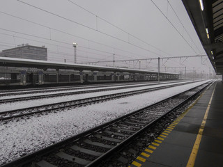 European Snowy Train Station and Tracks
