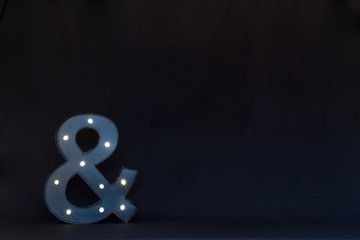Marquis Ampersand on Black Background
