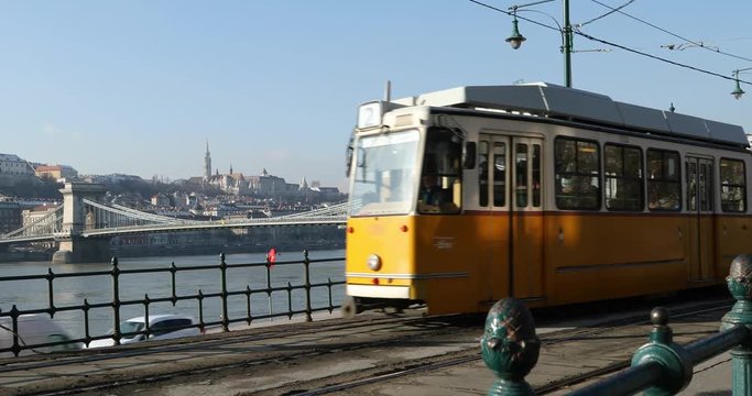 Budapest, Hungary, March 15 jan 2019 Old yellow Tram and chain bridge