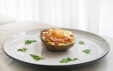 Delicious recipe for the breakfast of avocados stuffed with baked egg