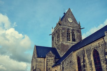 Parachute Memorial on Church Sainte-Mère-Église Roof