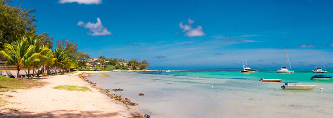 BAIN BOEUF Mauriutius. Beautiful beach in northern Mauritius. Coin de Mire, white sand beach among Palm trees