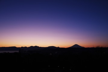 Mt.Fuji and its mountain range sunset silhouette