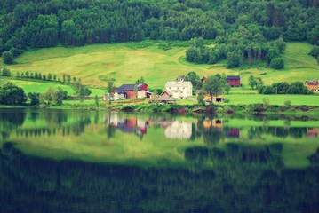 Fototapeta na wymiar Norway countryside in reflection. 