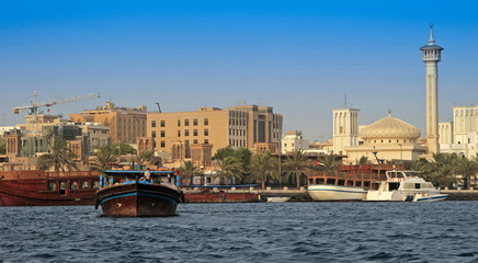 Naklejka premium Dhow ships, on the Creek, Dubai, Emirate of Dubai, United Arab Emirates, Asia