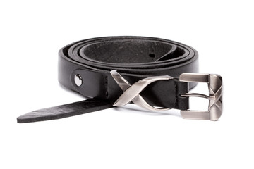 Thin black rolled belt with silver buckle isolated on white background. Studio shot