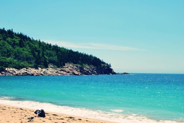 Fototapeta na wymiar Beach Bag on Sandy Beach in Maine Acadia National Park 