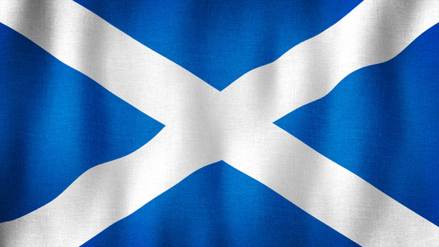 Scotland flag waving in the wind. Closeup of realistic Scottish flag with highly detailed fabric texture