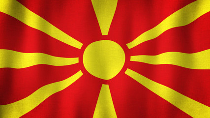 Macedonia flag waving in the wind. Closeup of realistic Macedonian flag with highly detailed fabric texture