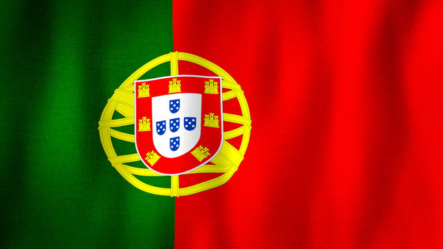 Portugal flag waving in the wind. Closeup of realistic Portuguese flag with highly detailed fabric texture
