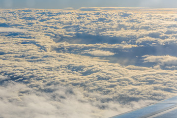 View on white clouds from the airplane window