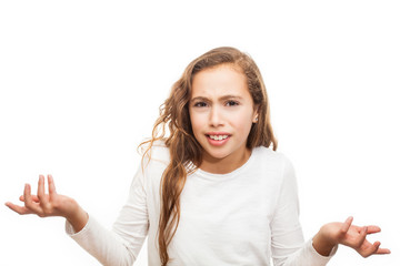Fototapeta premium Inquisitive grumpy young girl looking at the camera isolated on white background