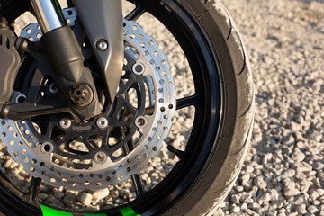 Fototapeta premium Close-up view on headlight and handlebars of luxury Motorcycle