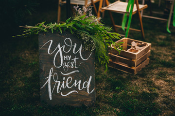 Wedding decor on-site registration in nature. Lavender flowers. The inscription on the slate - You...
