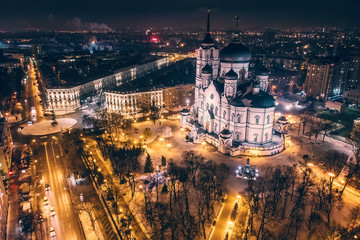 Fototapeta na wymiar Annunciation Cathedral on Revolution Avenue in Voronezh city, Russia in night time, aerial view from drone