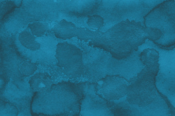 Watercolor blue texture with abstract washes and brush strokes on the white paper background. Digital paper background.