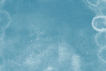 Watercolor blue texture with abstract washes and brush strokes on the white paper background. Digital paper background.