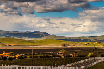 Rolling hills and clouds landscape near livermore California with vineyards