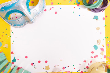 carnival confetti on white paper