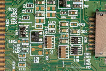 Green computer board with different electronics elements. texture